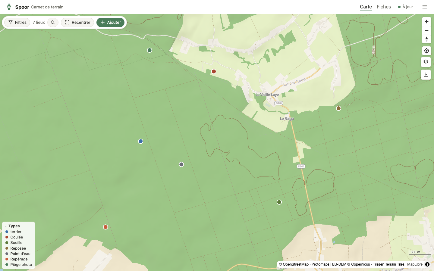 La carte de Spoor : sept lieux d'observation posés sur un massif forestier, chacun coloré selon son type, avec la légende des types et la barre d'actions.